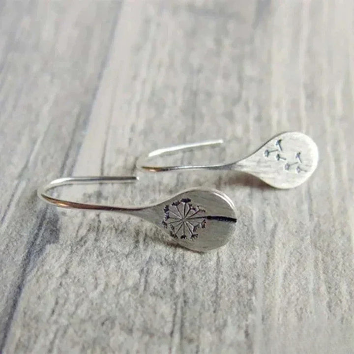 Pendientes de plata elegantes en diseño de hoja de diente de león